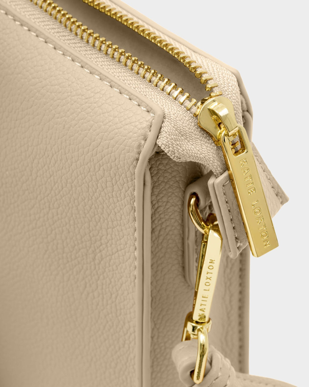 Avery slim cross body bag in Taupe