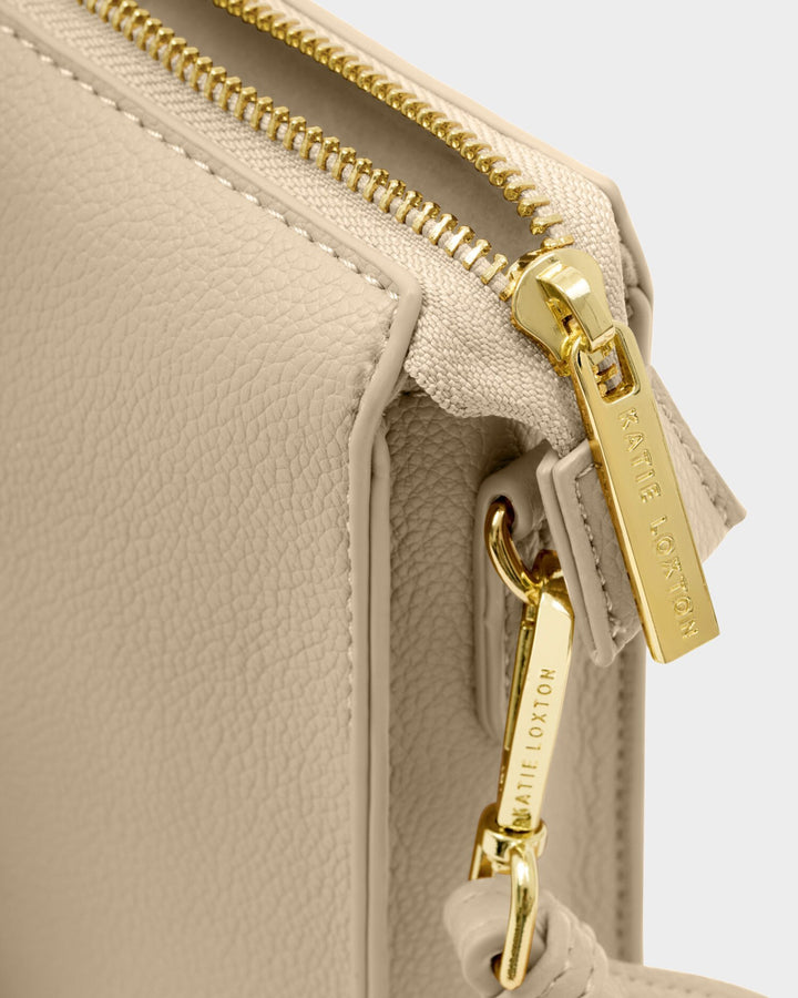 Avery slim cross body bag in Taupe