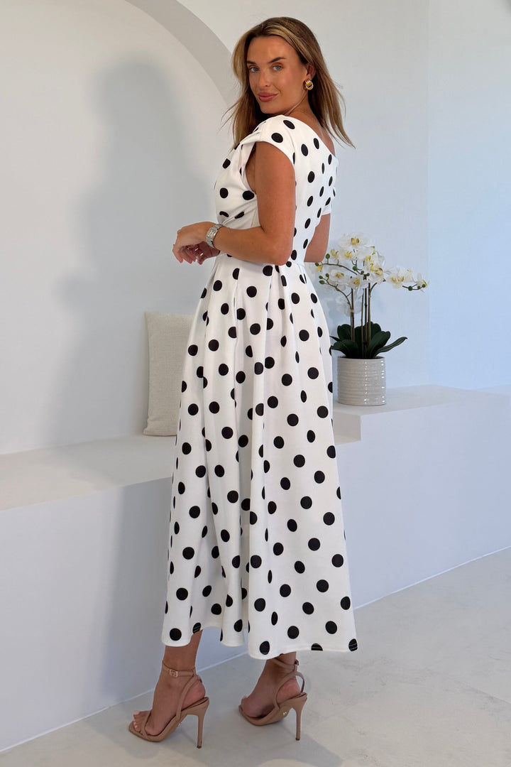 Betty Asymmetric dress in Black and white polko Dot